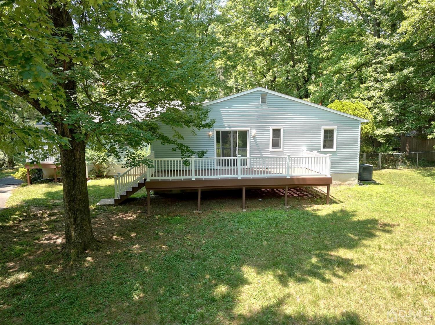 238 New Road Monmouth Junction, NJ 08852 - Photo 46 of 63 a view of a house with a yard