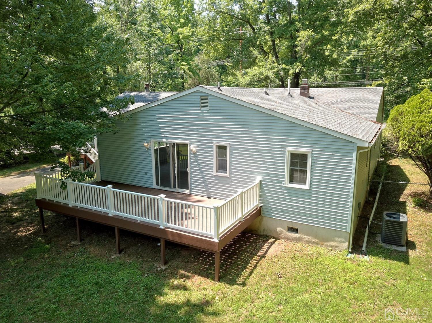 238 New Road Monmouth Junction, NJ 08852 - Photo 47 of 63 a view of a house with a yard