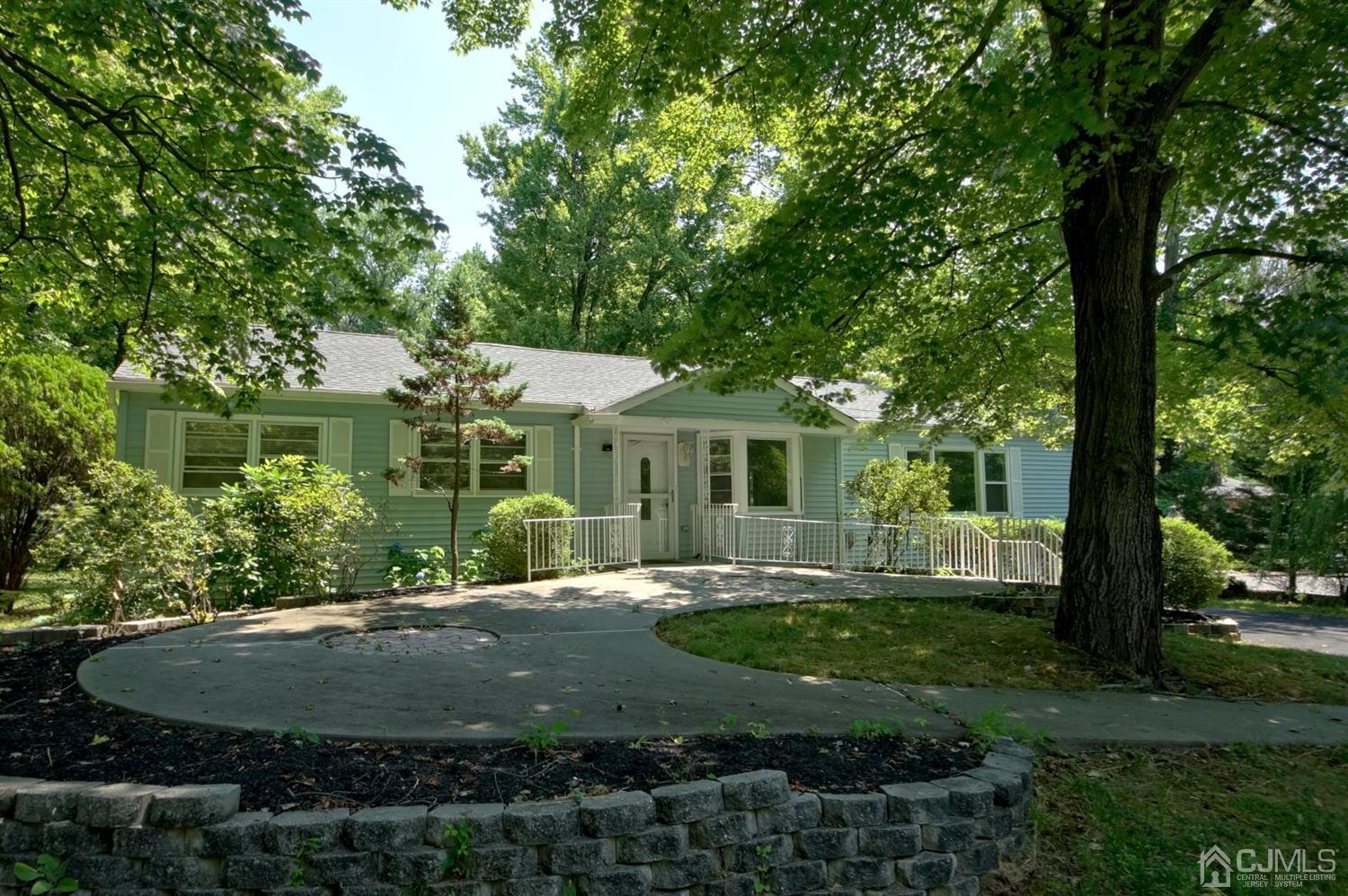 238 New Road Monmouth Junction, NJ 08852 - Photo 6 of 63 a view of a house with a yard