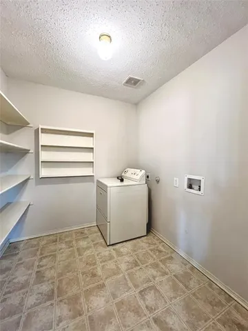 a room with a furniture and window