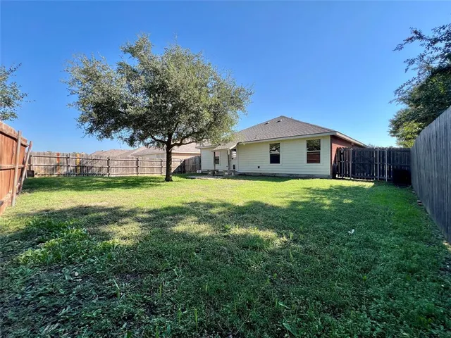 a house view with a outdoor space