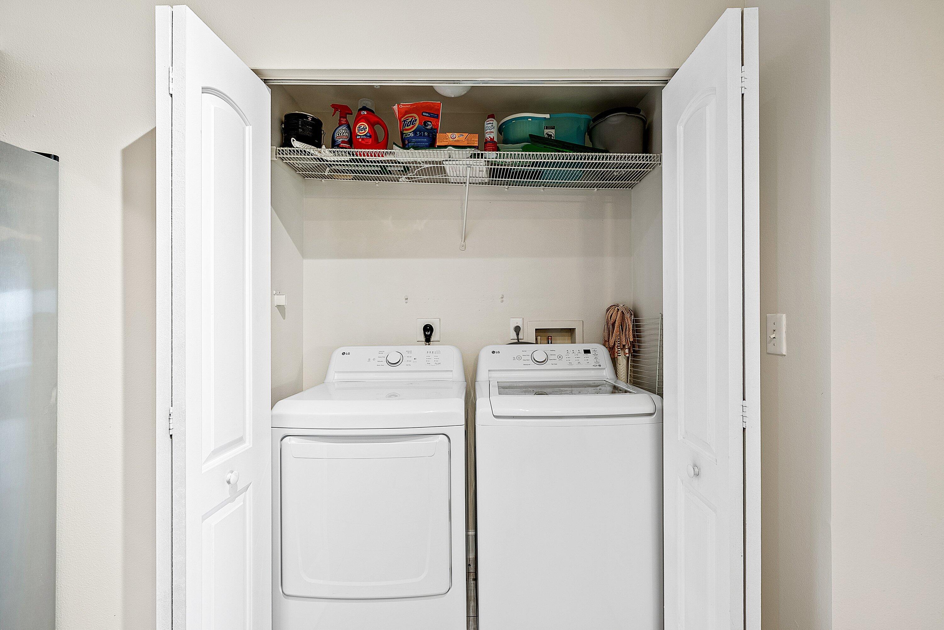 255 Northeast 3rd Avenue, Unit 2503 Delray Beach, FL 33444 - Photo 13 of 27 a utility room with dryer and washer