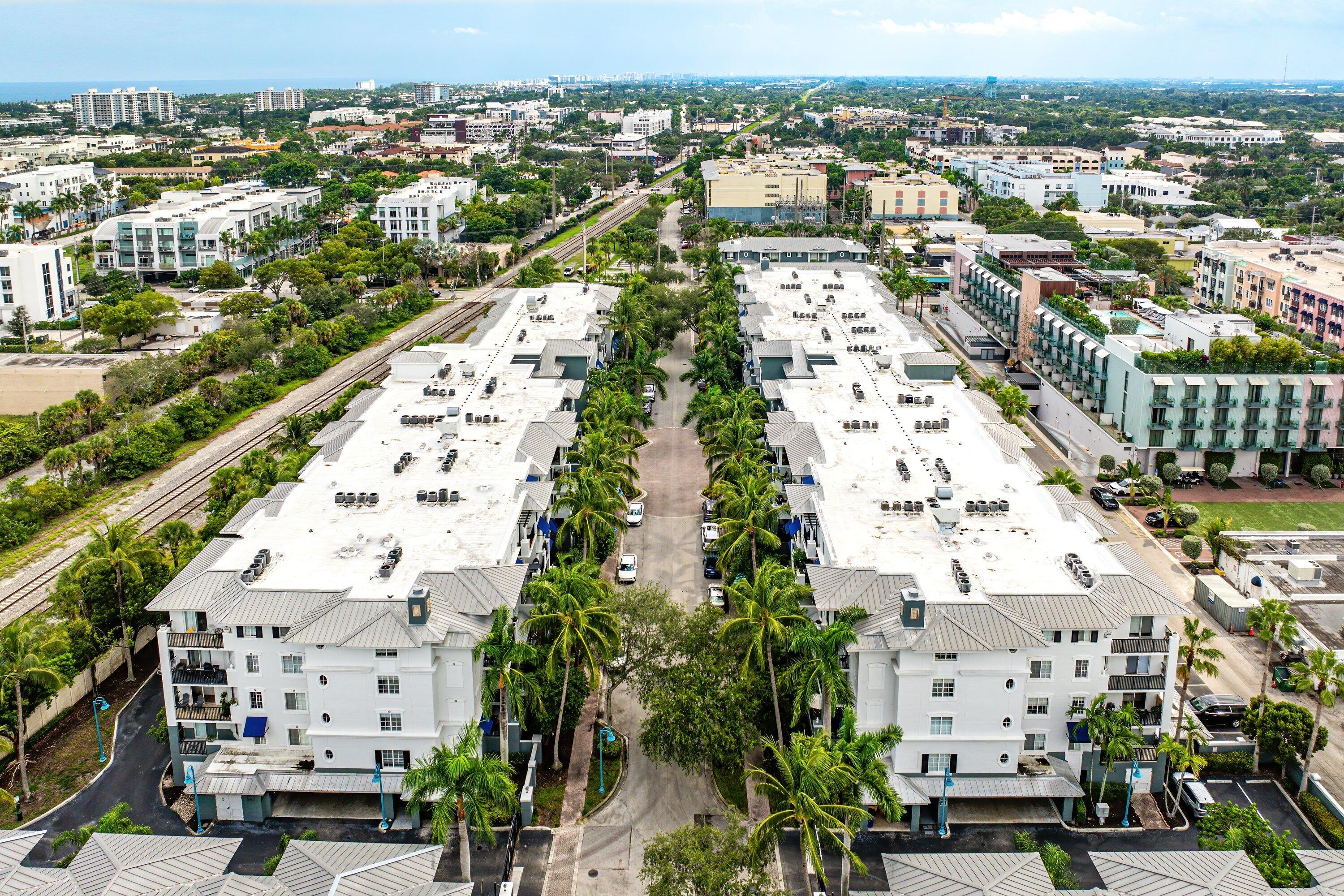 255 Northeast 3rd Avenue, Unit 2503 Delray Beach, FL 33444 - Photo 25 of 27 an aerial view of residential houses with outdoor space