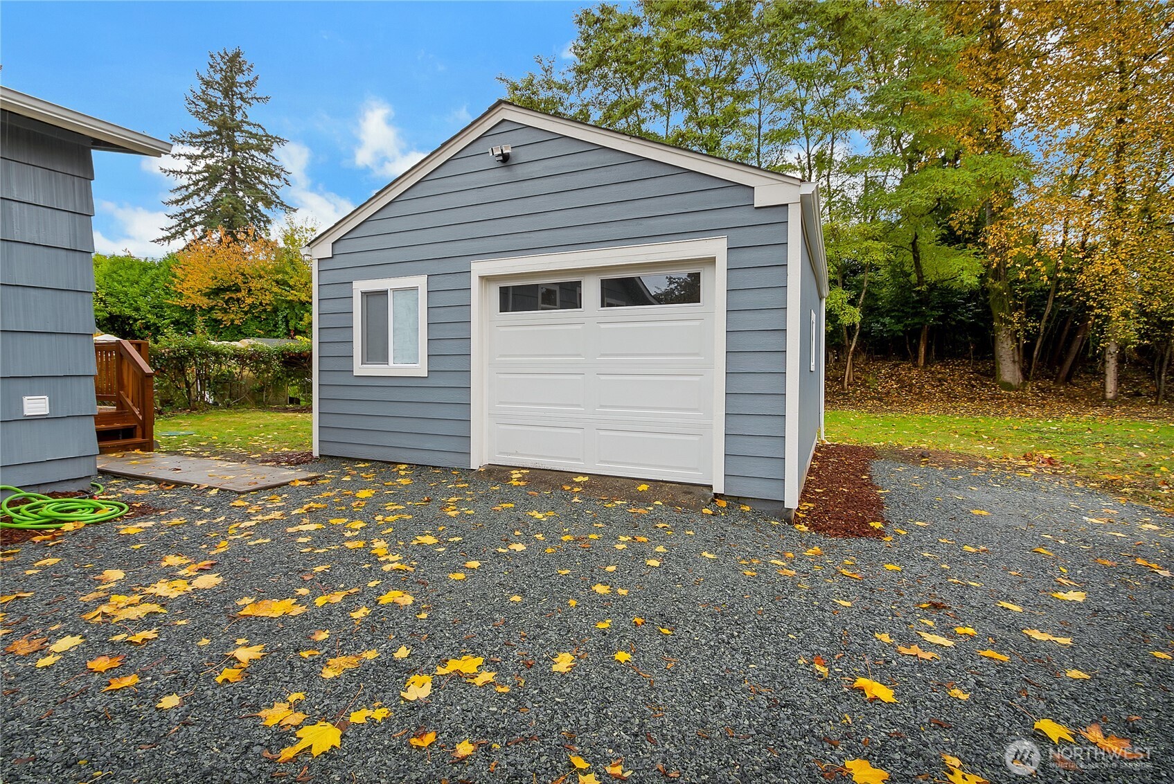 99 Sumner Avenue Sumner, WA 98390 - Photo 26 of 27 a view of a house with a yard