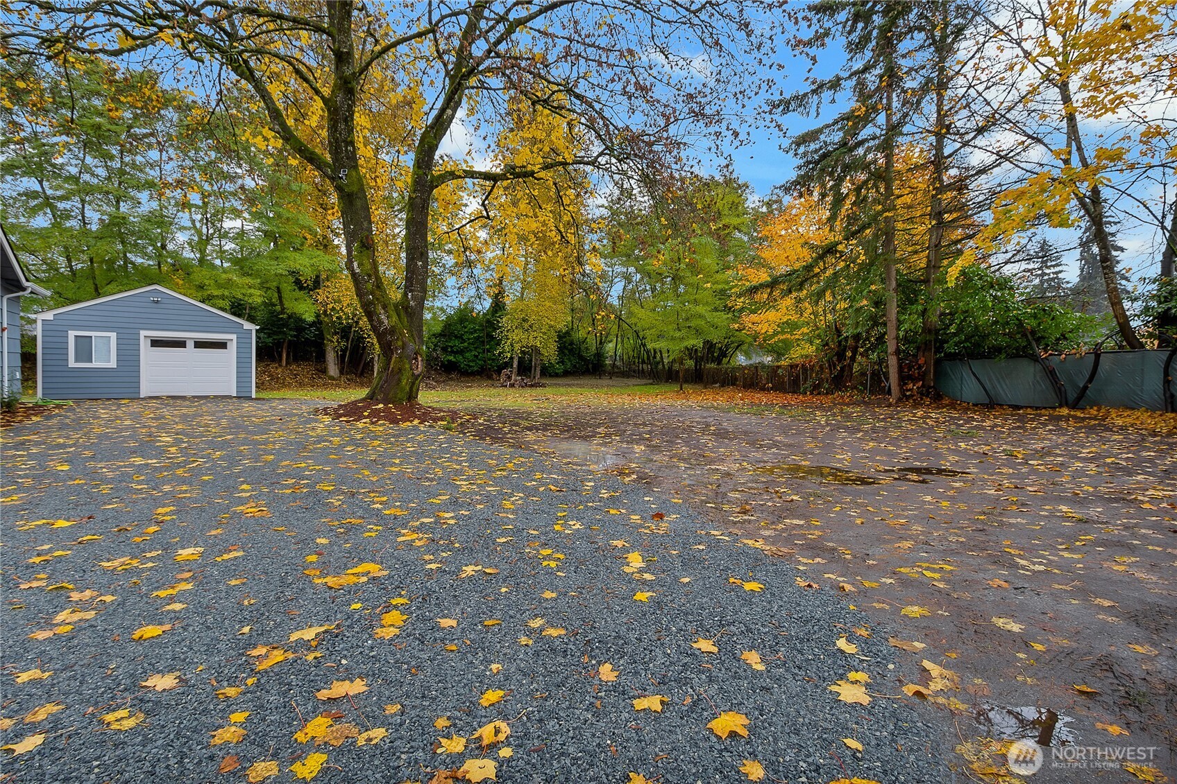 99 Sumner Avenue Sumner, WA 98390 - Photo 27 of 27 a front view of a house with a tree in the background