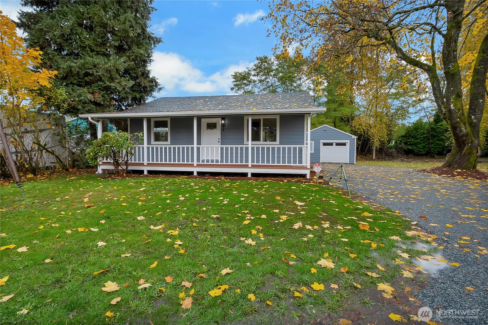 99 Sumner Avenue Sumner, WA 98390 - Photo 3 of 27 a view of a house with a yard and sitting area