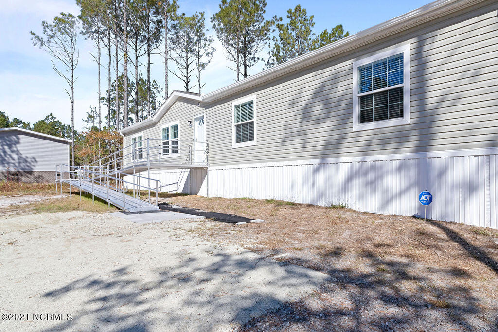 259 Old Folkstone Road Holly Ridge, NC 28445 - Photo 2 of 26 IMG_6981