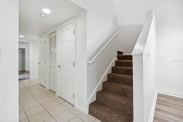 a view of a hallway with entryway