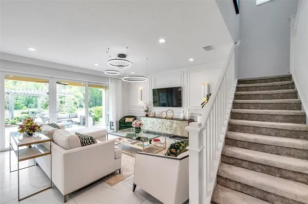 a bedroom with a bed and ceiling fan