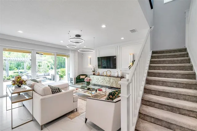 a bedroom with a bed and ceiling fan