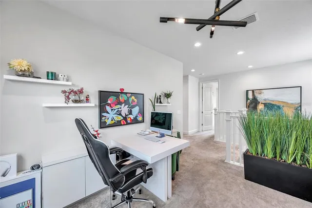 a kitchen with a sink and large window