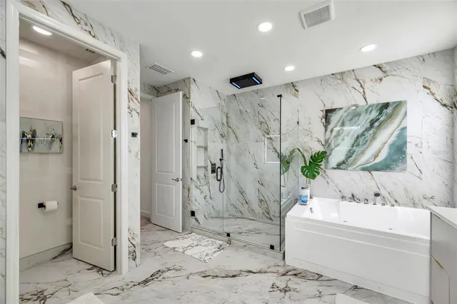 a front view of a house with garden and porch