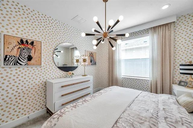 an aerial view of residential building with outdoor space and ocean view