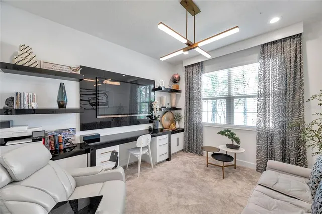 a bathroom with a sink a mirror and a lamp