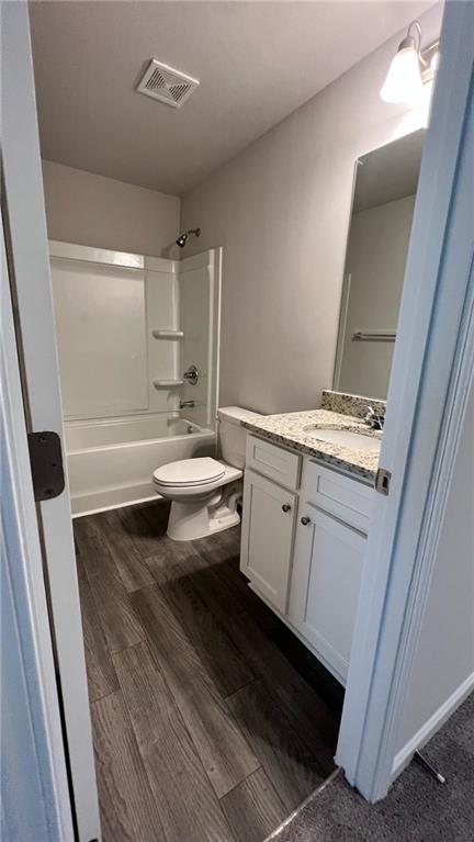 4352 Shaffer Ct Union, Unit 58 Union City, GA 30291 - Photo 17 of 19 a bathroom with a sink a toilet a mirror and shower