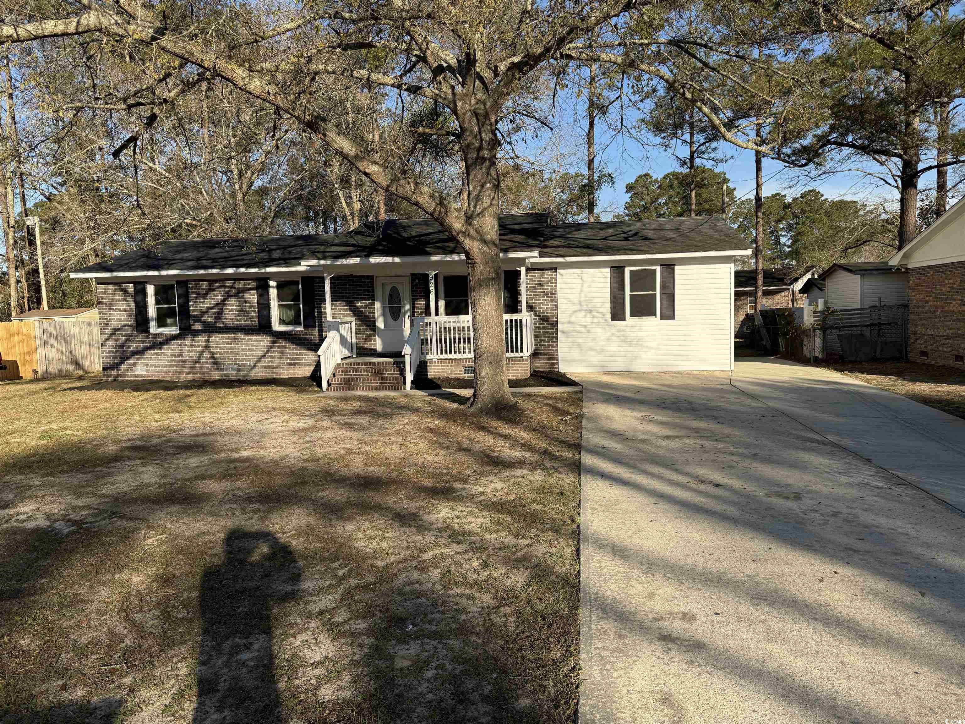926 Forest Loop Road Conway, SC 29527 - Photo 1 of 14 View of front of home with a porch, fence, and driveway