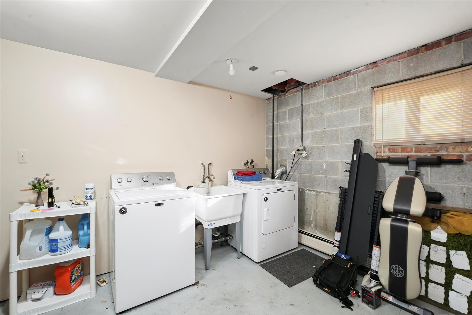 69 East Quincy Street, Unit 2 Riverside, IL 60546 - Photo 17 of 22 a storage room with washer and dryer