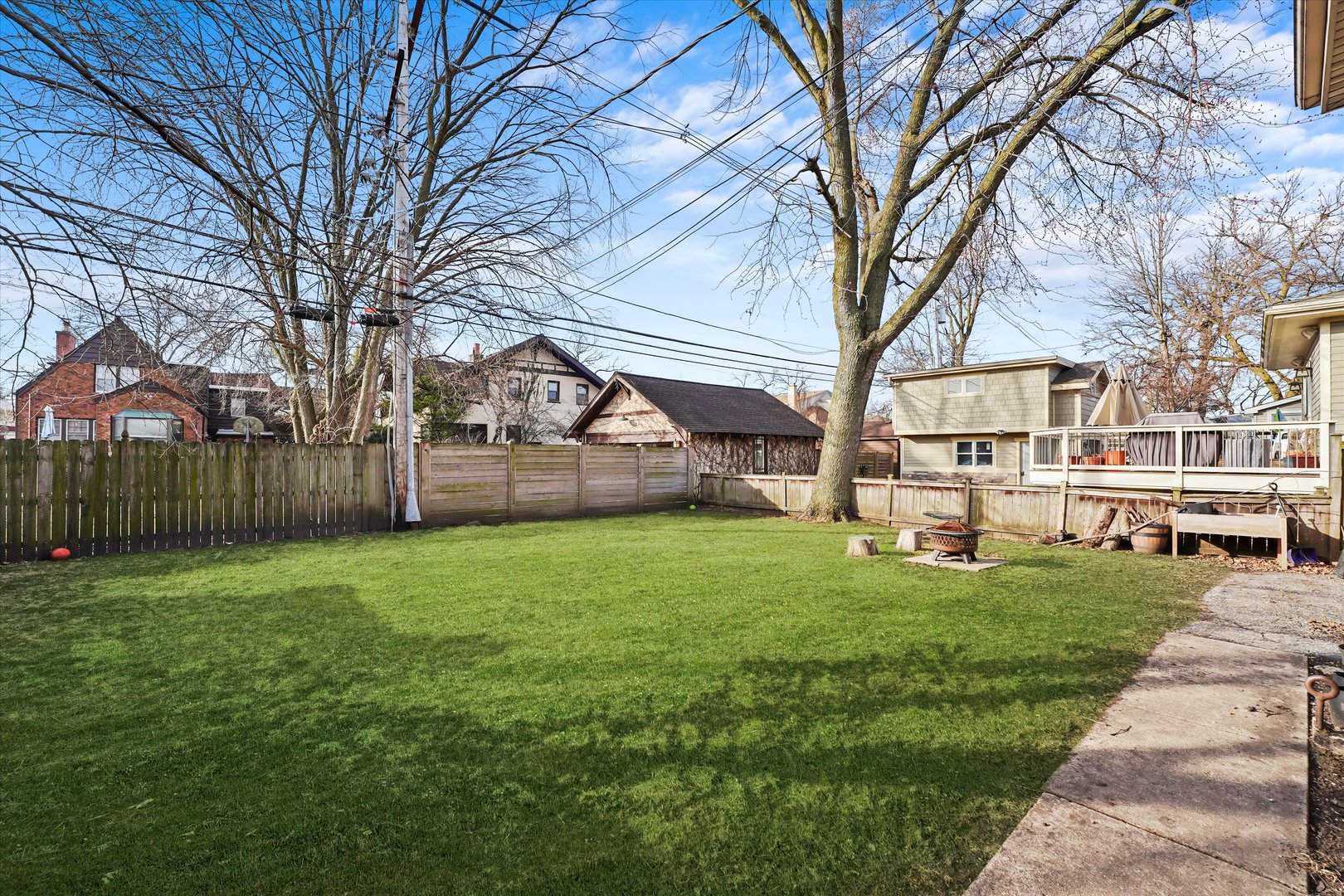 69 East Quincy Street, Unit 2 Riverside, IL 60546 - Photo 18 of 22 a view of a house with backyard and a tree