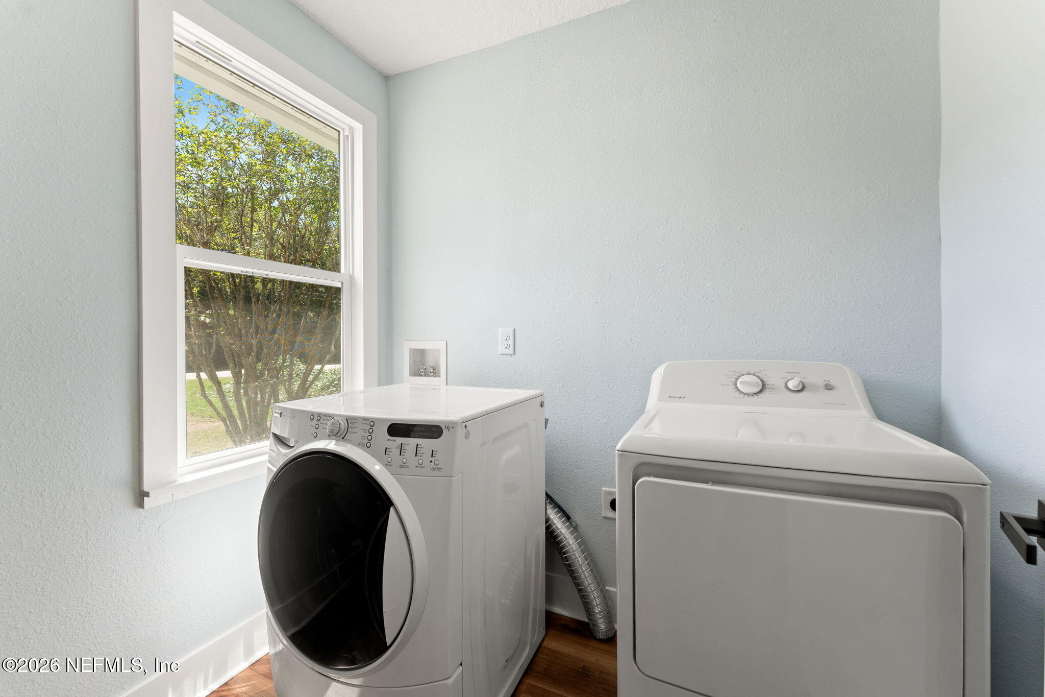 2655 Community Road Jacksonville, FL 32207 - Photo 23 of 26 a utility room with dryer and washer