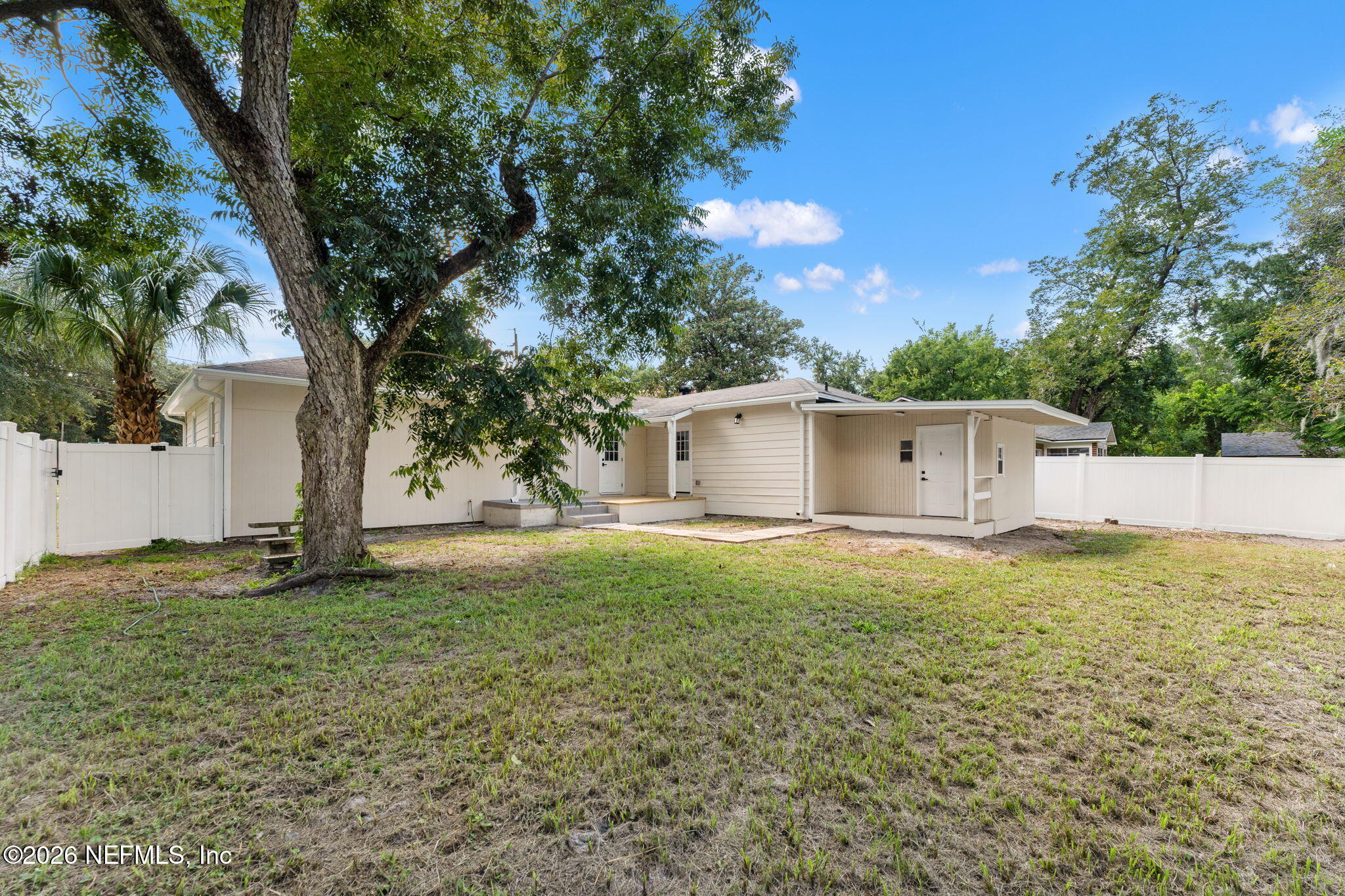 2655 Community Road Jacksonville, FL 32207 - Photo 25 of 26 a house with garden in front of it