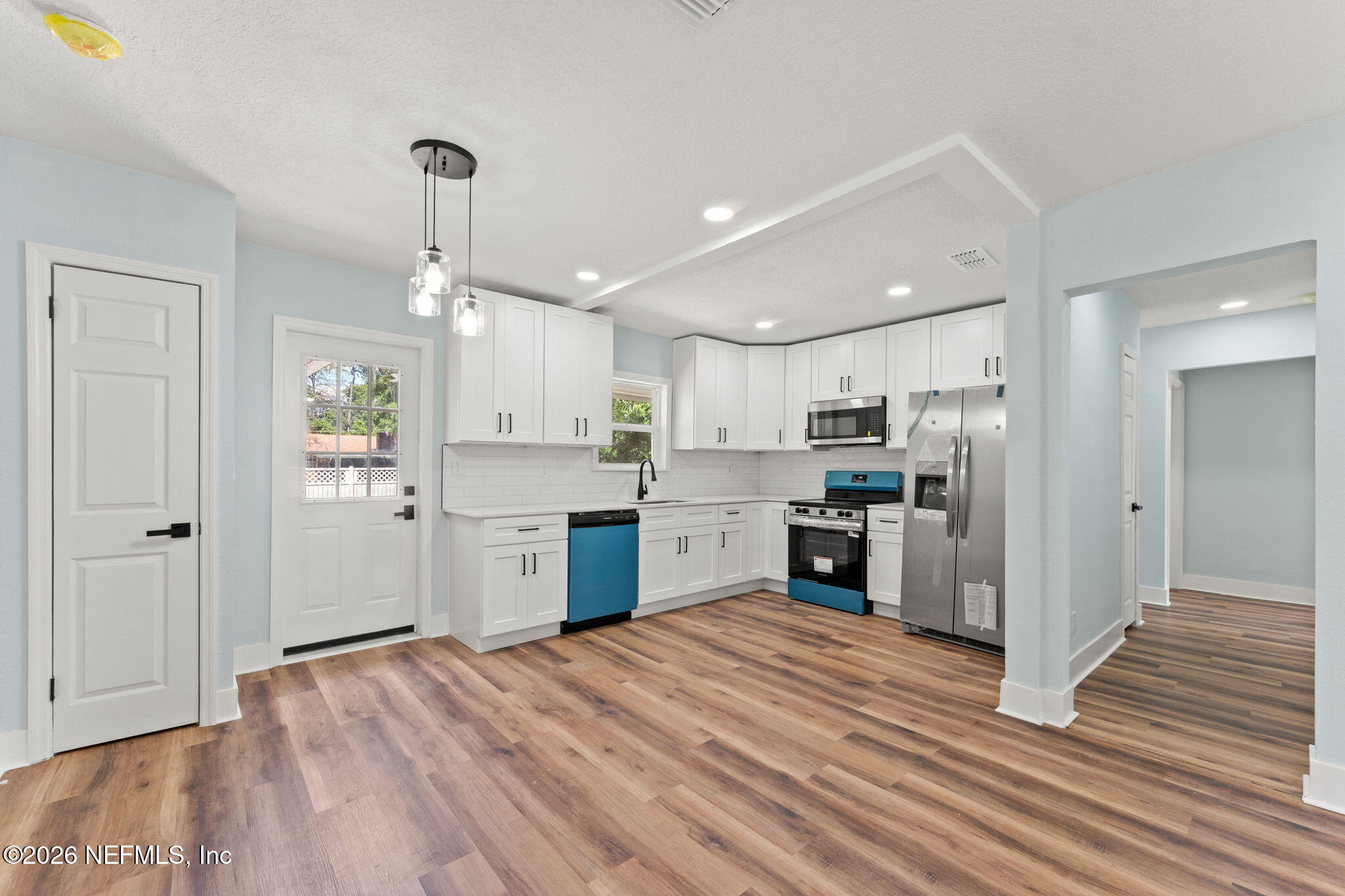 2655 Community Road Jacksonville, FL 32207 - Photo 9 of 26 a large kitchen with a lot of counter space cabinets and appliances