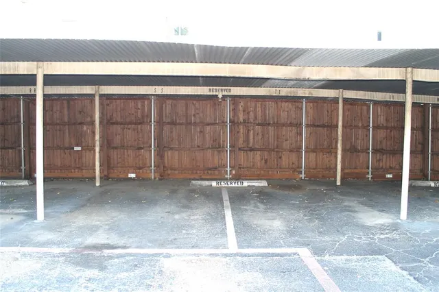 a view of an empty room with a garage