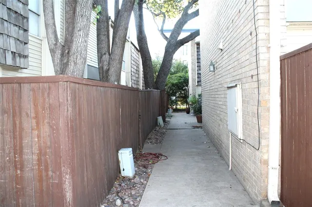 a view of a pathway with a house