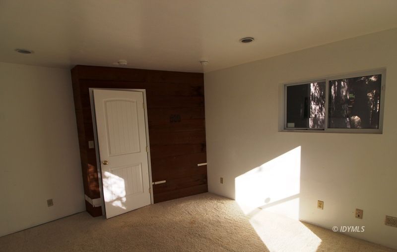 24601 Bluff Road Idyllwild, CA 92549 - Photo 18 of 24 a view of an empty room with a window