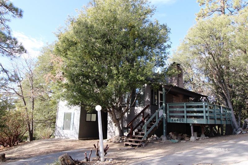 24601 Bluff Road Idyllwild, CA 92549 - Photo 22 of 24 a front view of a house with a tree