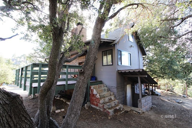 24601 Bluff Road Idyllwild, CA 92549 - Photo 4 of 24 a view of a house with a tree