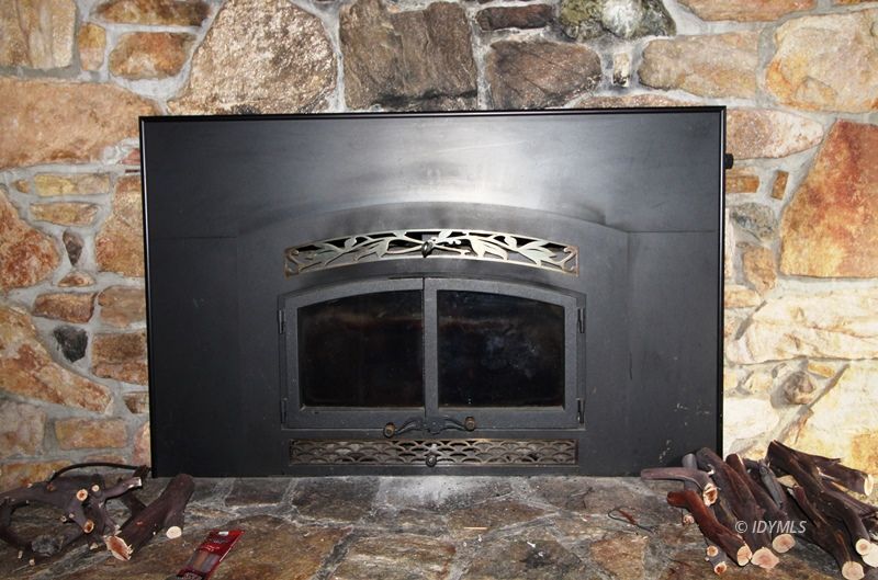 24601 Bluff Road Idyllwild, CA 92549 - Photo 9 of 24 a close view of a fireplace in a room