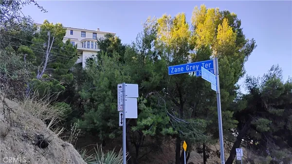 a sign that is on the side of the road