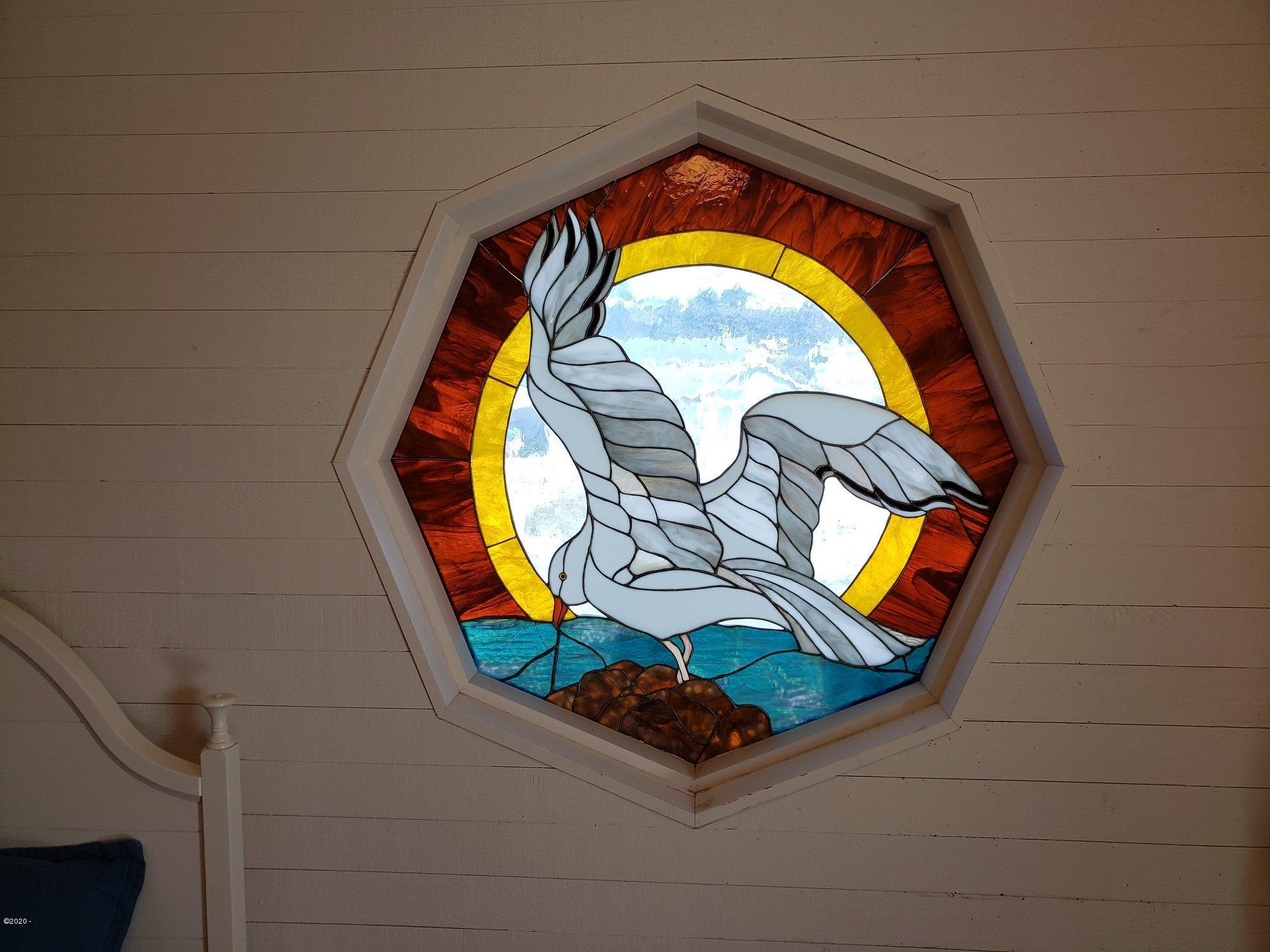 2306 Northwest Oceania Drive Waldport, OR 97394 - Photo 19 of 37 Stain glass