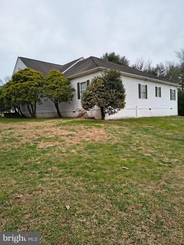 a house view with a garden space