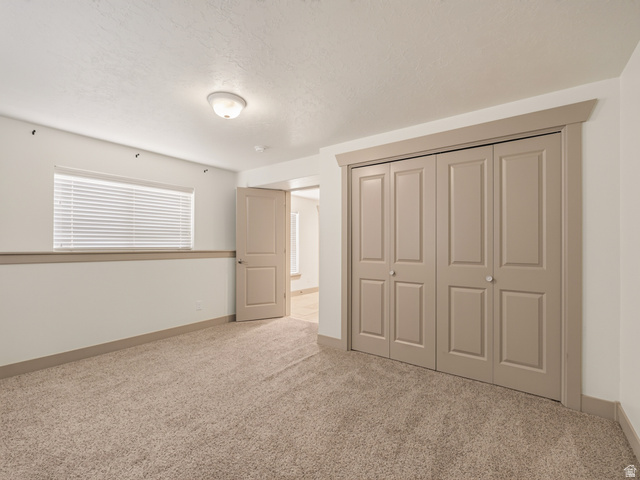 1279 West 1500th Street North Mapleton, UT 84664 - Photo 61 of 83 Neutral-toned carpeting throughout this space with a paneled bi-fold closet