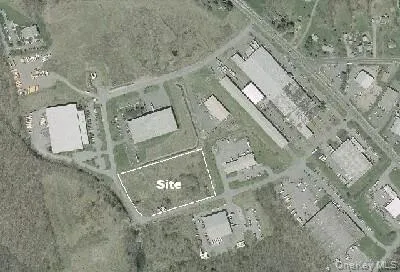 an aerial view of a house with outdoor space