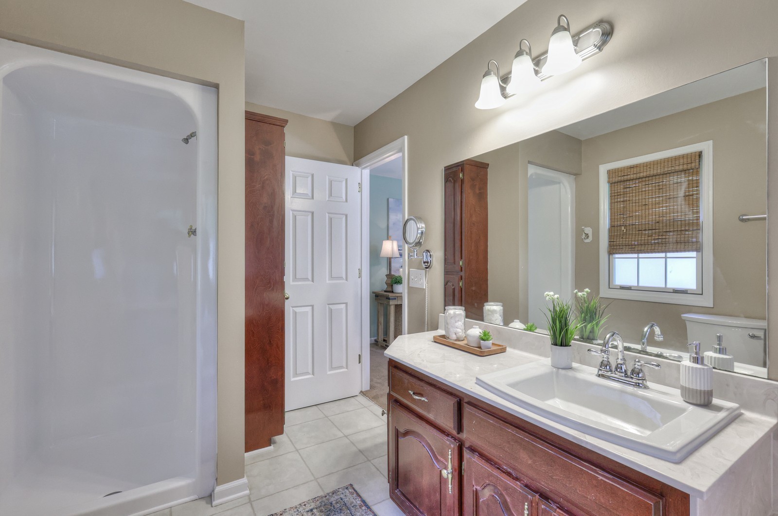 8775 Rockvale Road Rockvale, TN 37153 - Photo 17 of 34 a bathroom with a double vanity sink and a mirror