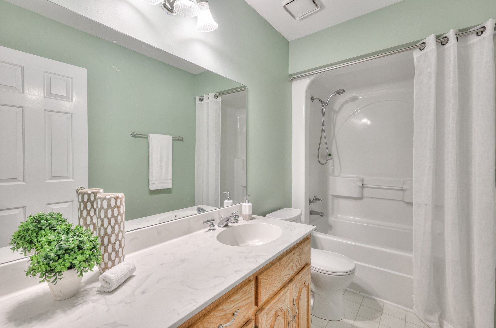 8775 Rockvale Road Rockvale, TN 37153 - Photo 23 of 34 a bathroom with a granite countertop sink a toilet and shower
