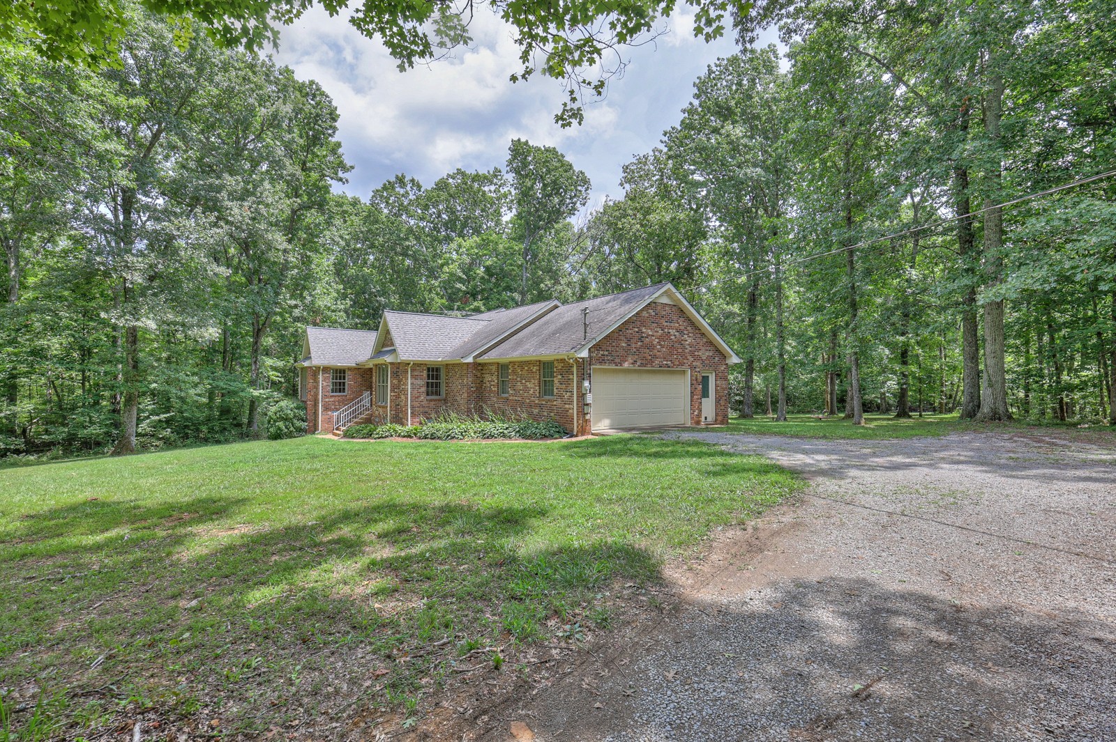 8775 Rockvale Road Rockvale, TN 37153 - Photo 3 of 34 a view of a house and yard with green space