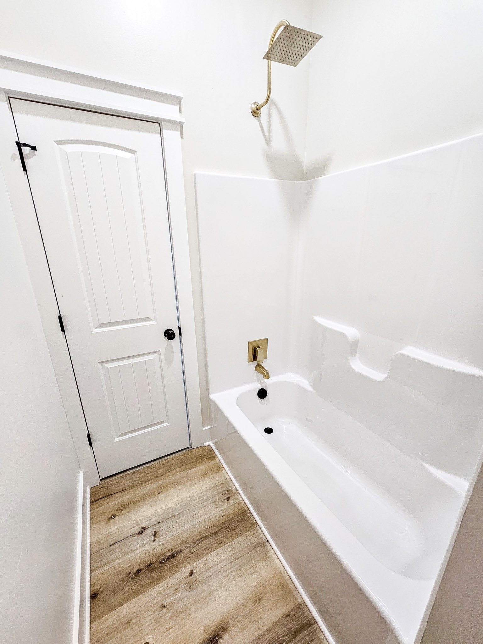 1601 Old Estill Springs Road Tullahoma, TN 37388 - Photo 13 of 37 a bathroom with a tub a sink and a shower