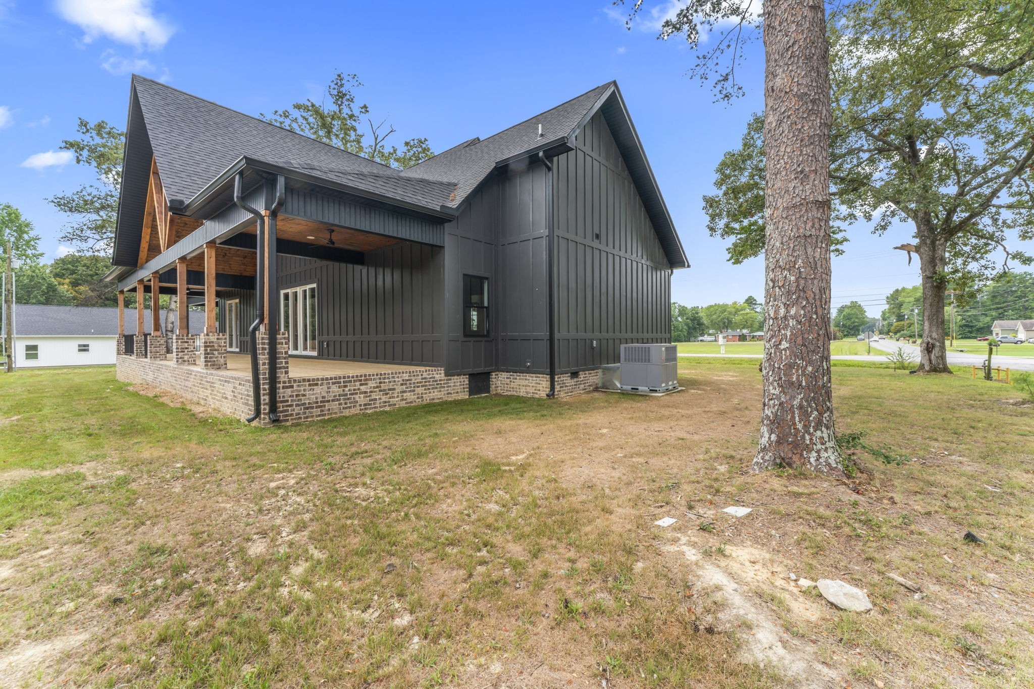 1601 Old Estill Springs Road Tullahoma, TN 37388 - Photo 29 of 37 a view of a house with backyard and trees