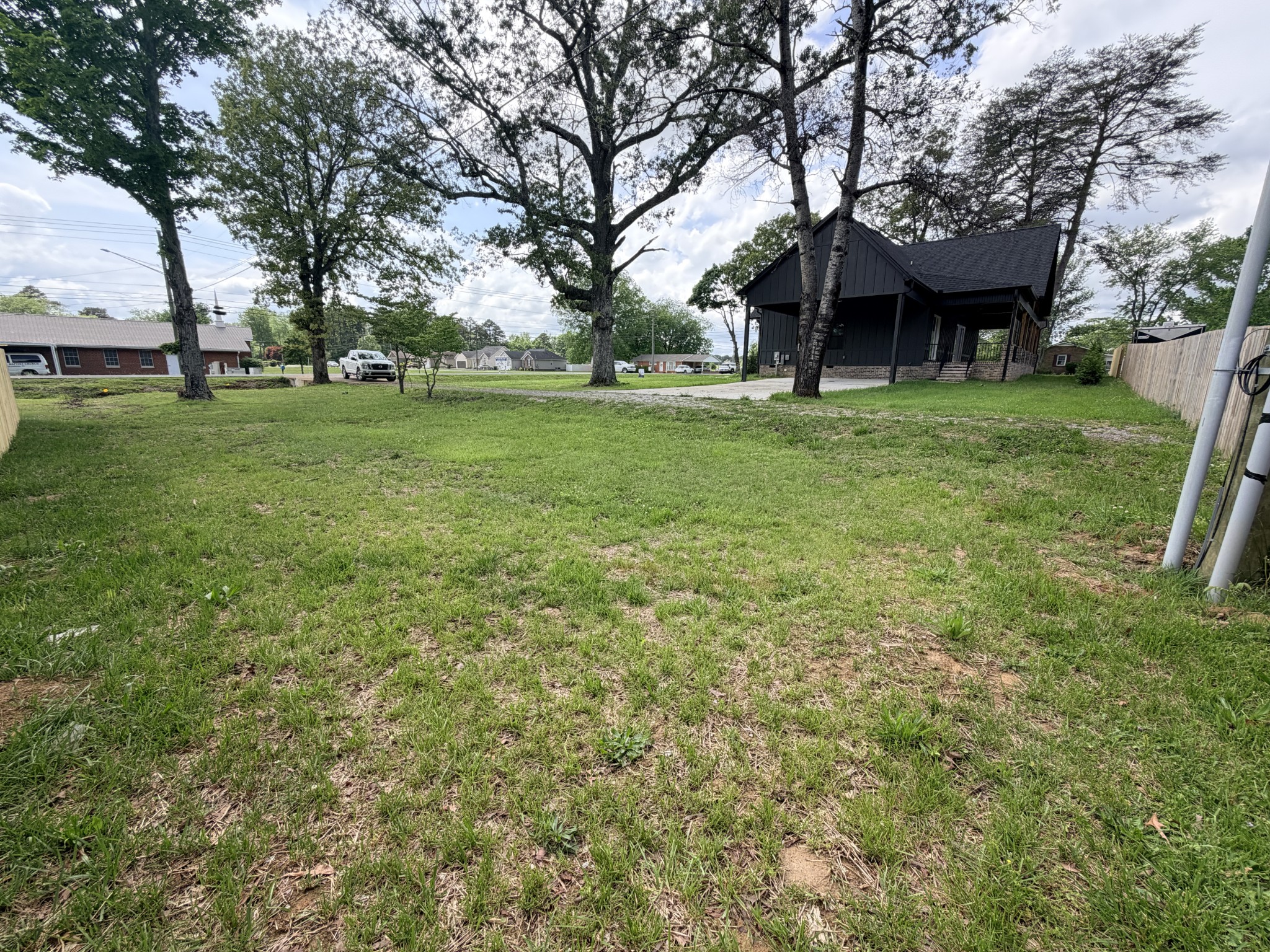 1601 Old Estill Springs Road Tullahoma, TN 37388 - Photo 32 of 37 a view of a house with a big yard and large tree