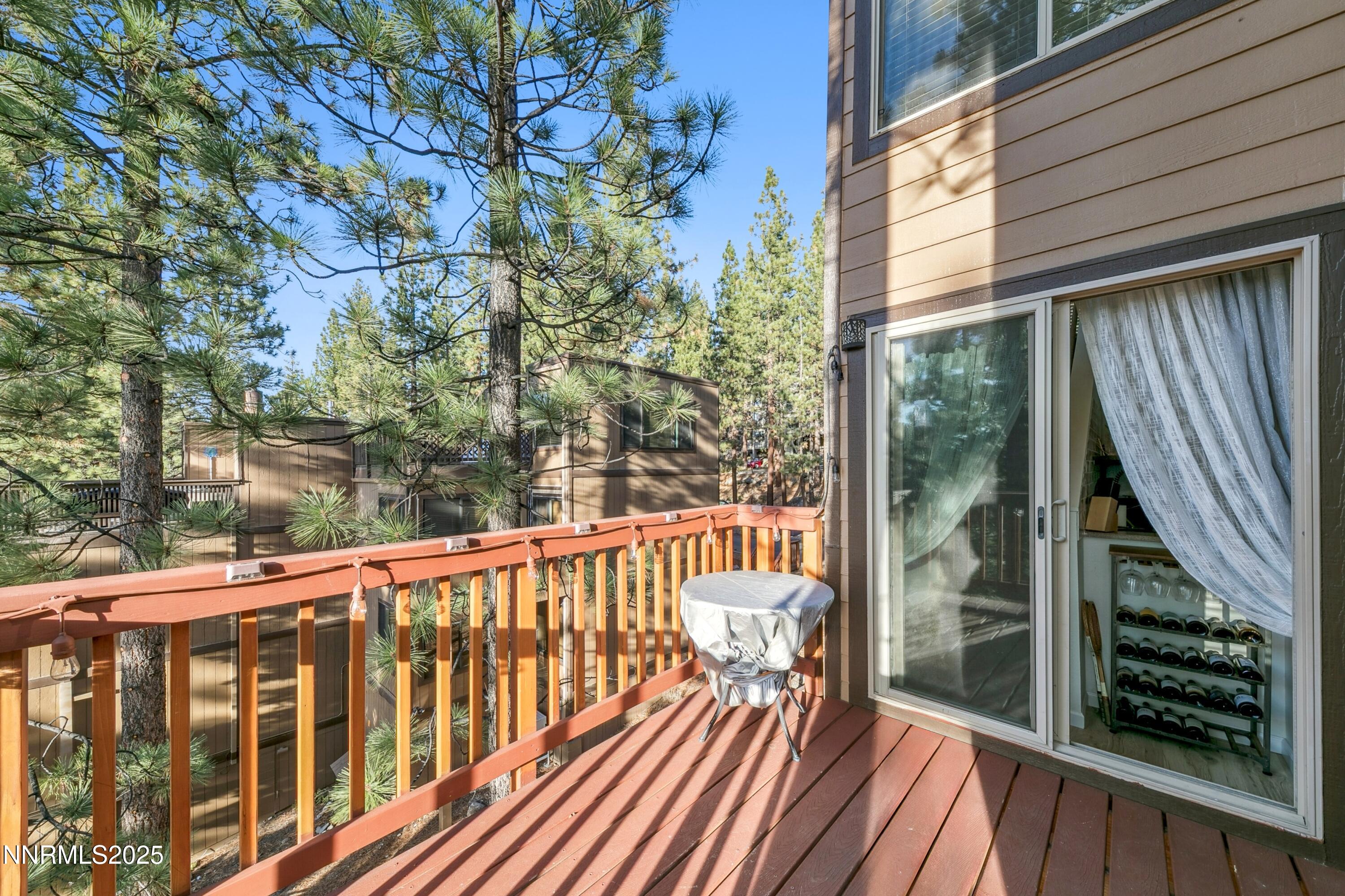 230 Clubhouse Circle Stateline, NV 89449 - Photo 15 of 44 a view of a balcony with wooden floor