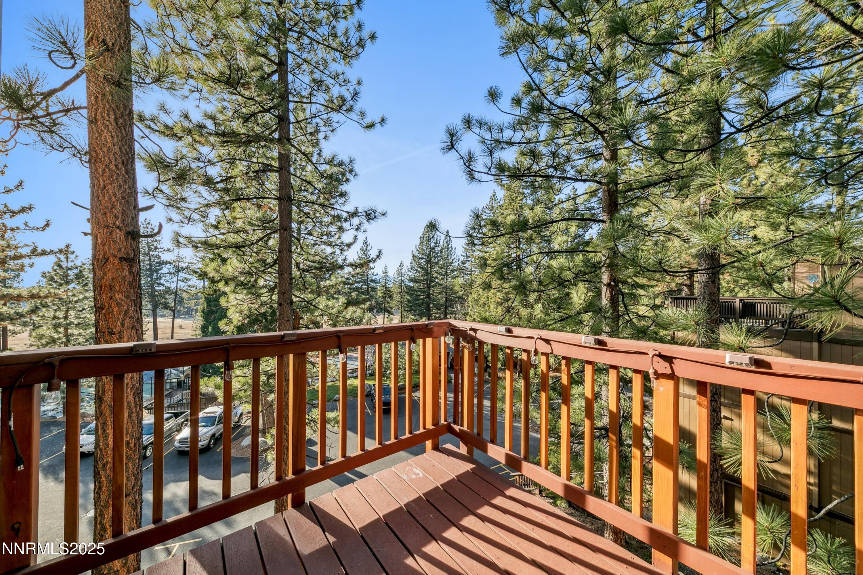 230 Clubhouse Circle Stateline, NV 89449 - Photo 16 of 44 a balcony with wooden floor and fence
