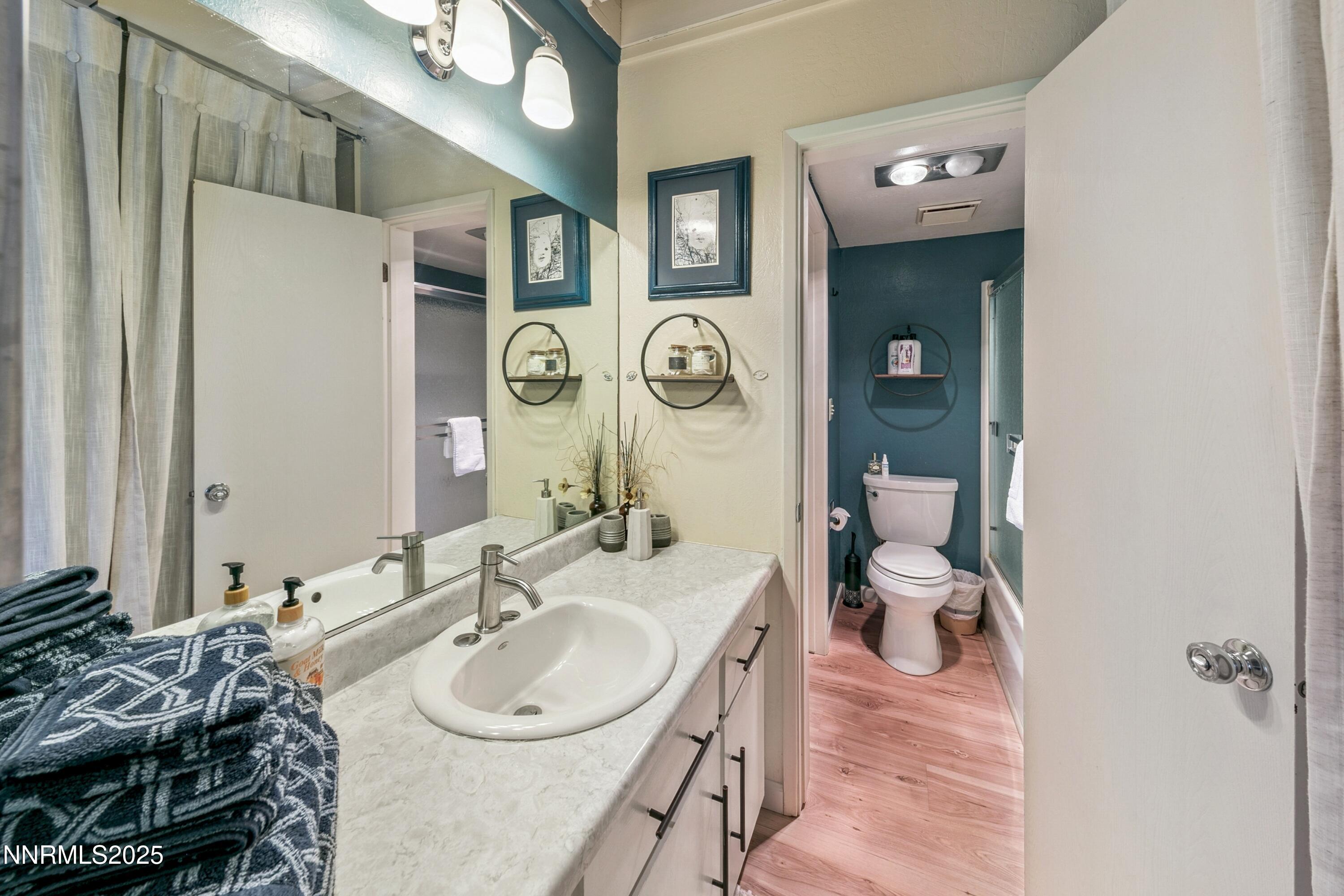 230 Clubhouse Circle Stateline, NV 89449 - Photo 22 of 44 a bathroom with a sink and a mirror