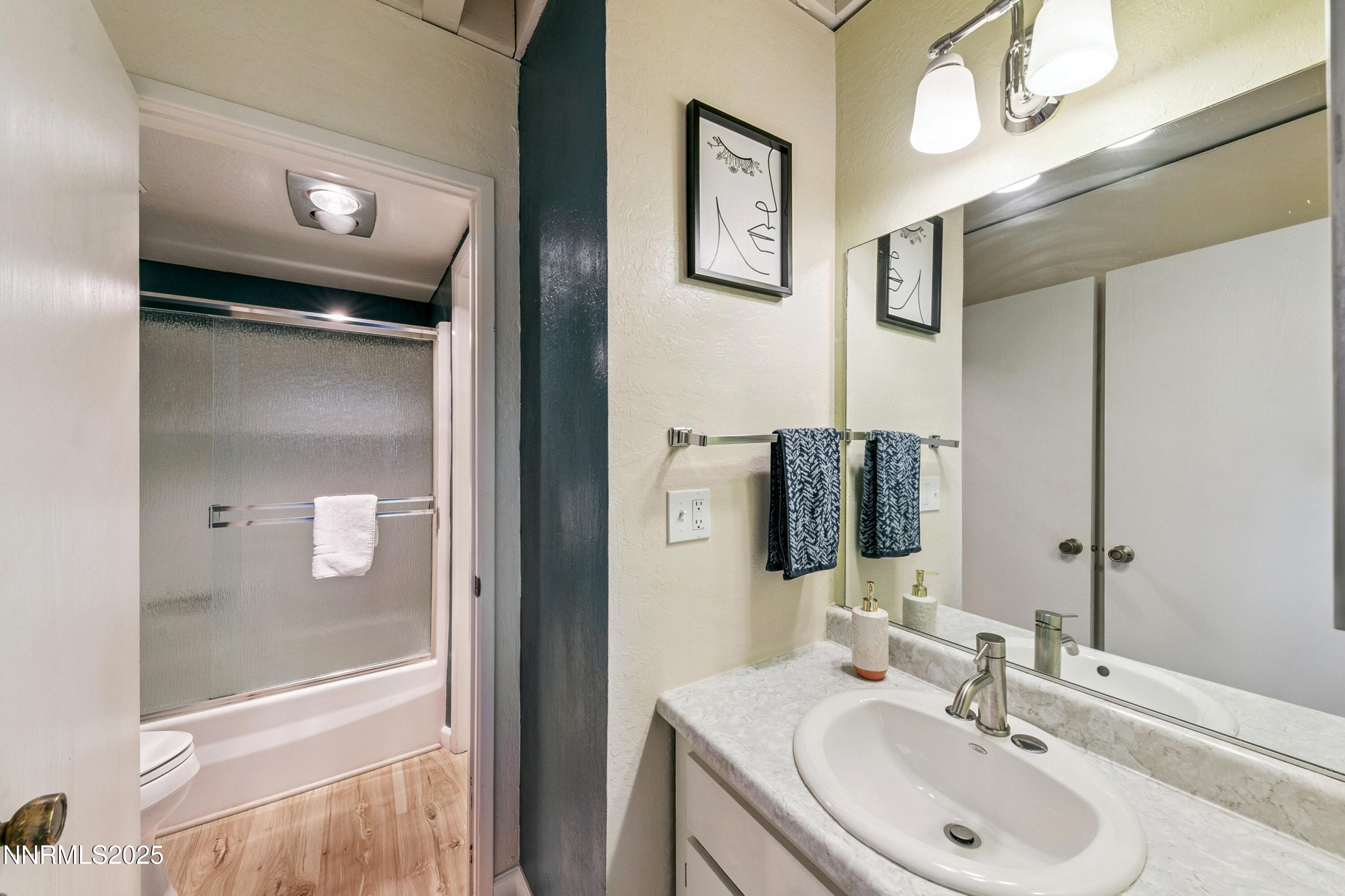 230 Clubhouse Circle Stateline, NV 89449 - Photo 23 of 44 a bathroom with a sink and a mirror