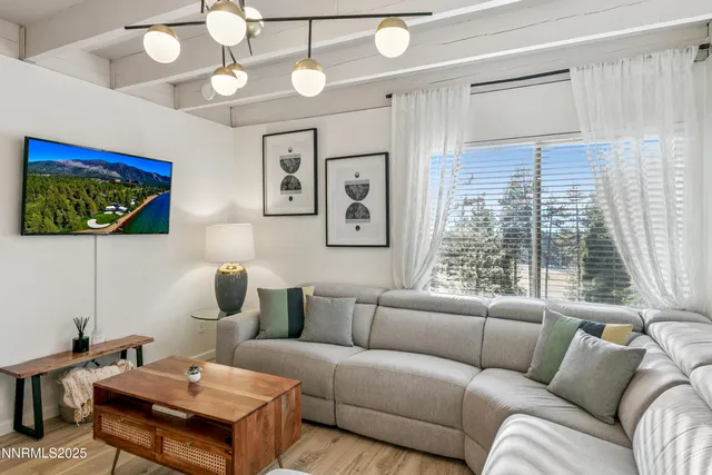 a kitchen with a table and chairs in it