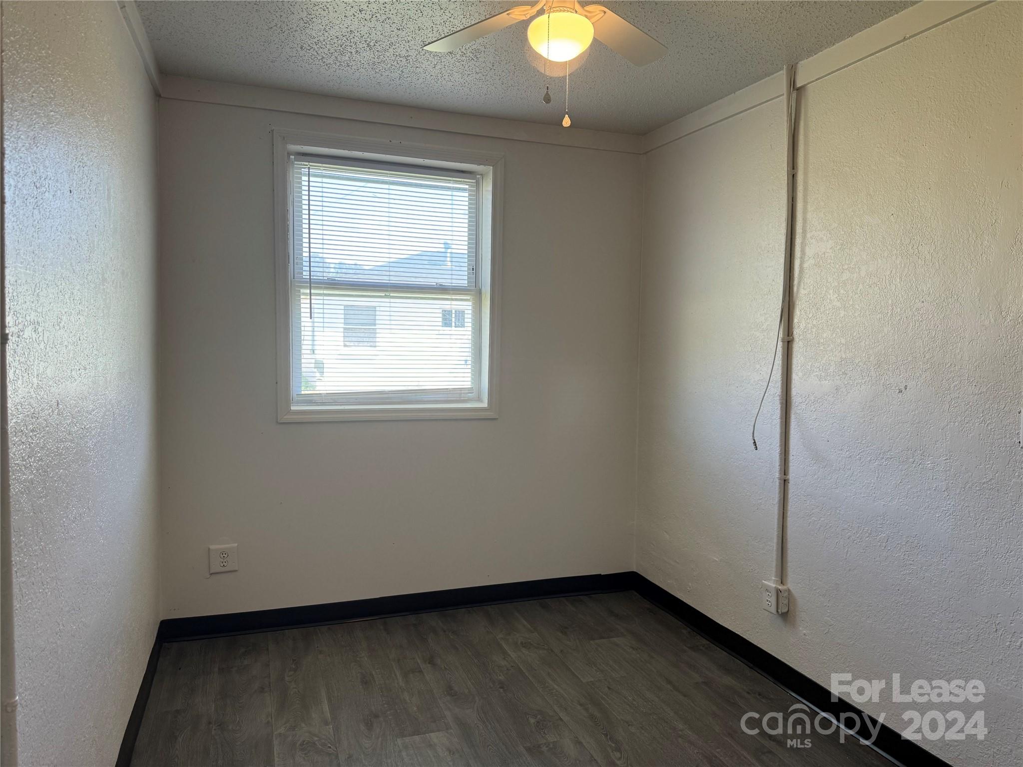 200 York Street, Unit M6 Chester, SC 29706 - Photo 14 of 14 an empty room with a window