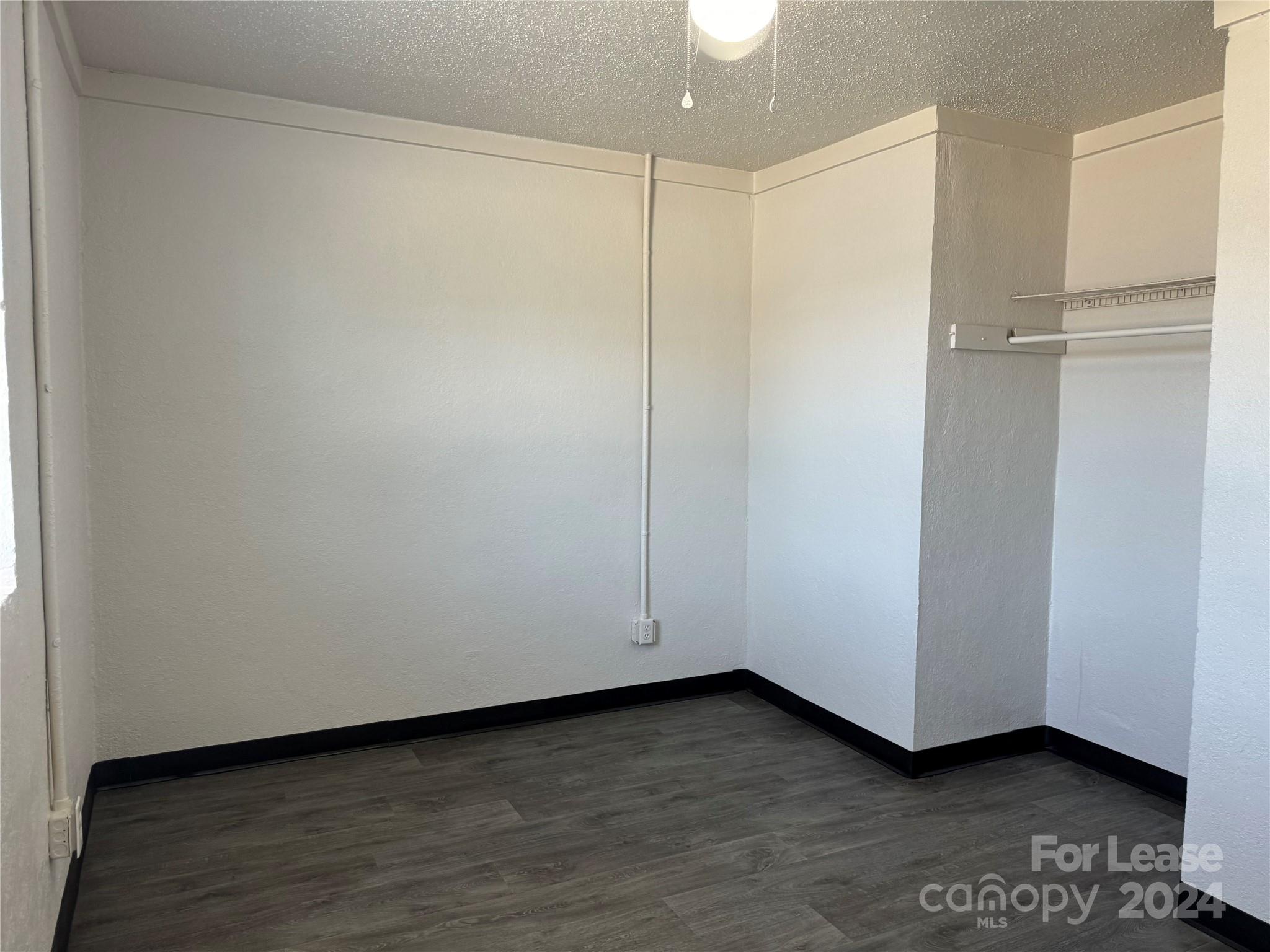 200 York Street, Unit M6 Chester, SC 29706 - Photo 8 of 14 a view of a room with wooden floor