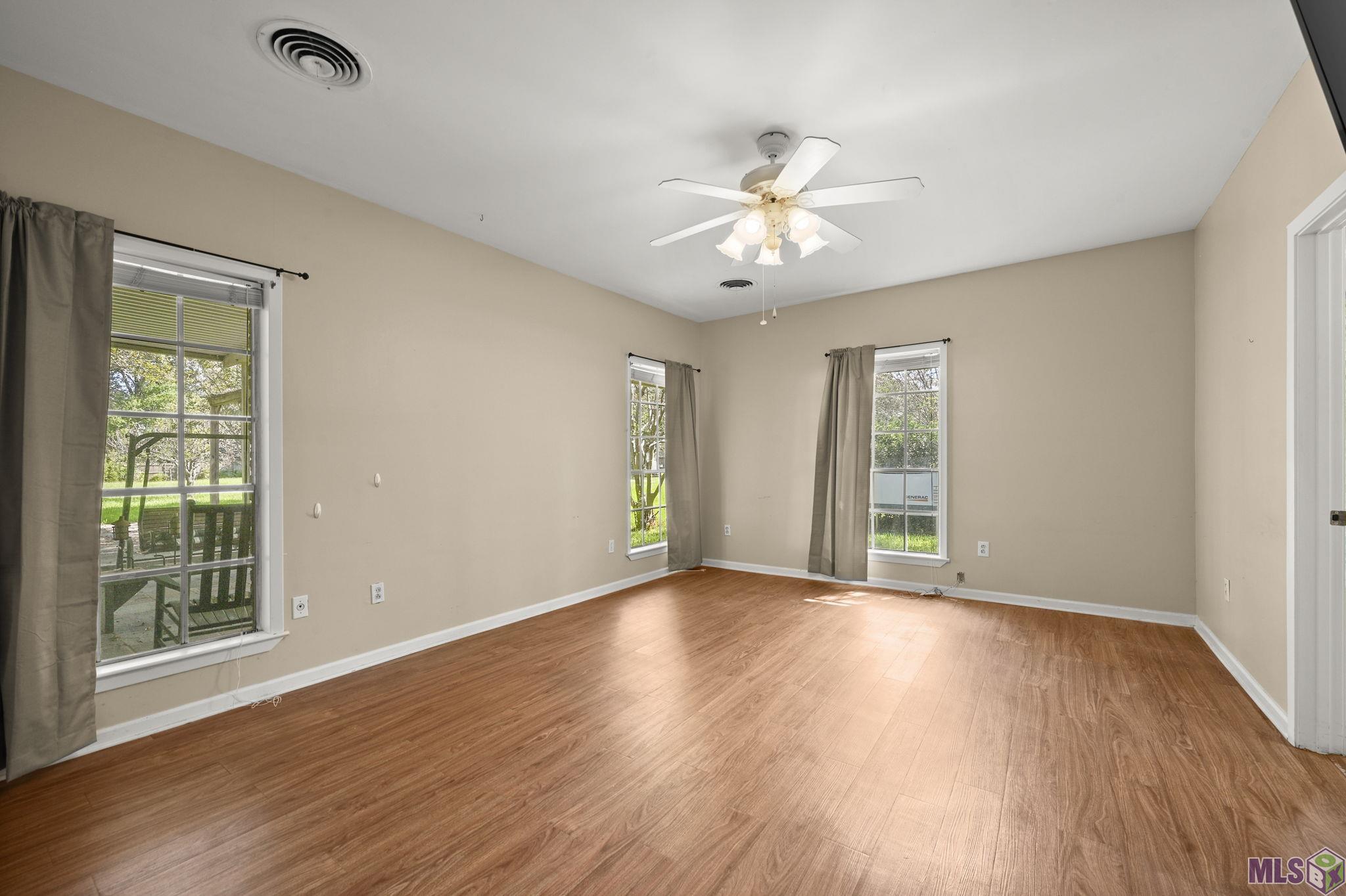 405 North College Street Denham Springs, LA 70726 - Photo 20 of 39 Primary Bedroom